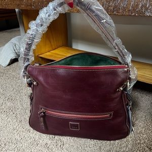 New Burgundy Dooney and Bourke satchel purse. NWT